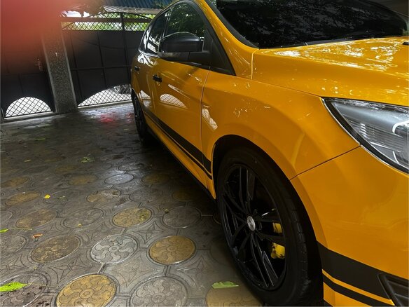 2016 Ford Focus III Рестайлинг, жёлтый, 808000 рублей - вид 4
