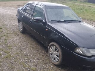 2009 Daewoo Nexia I Рестайлинг, чёрный, 125000 рублей, вид 1