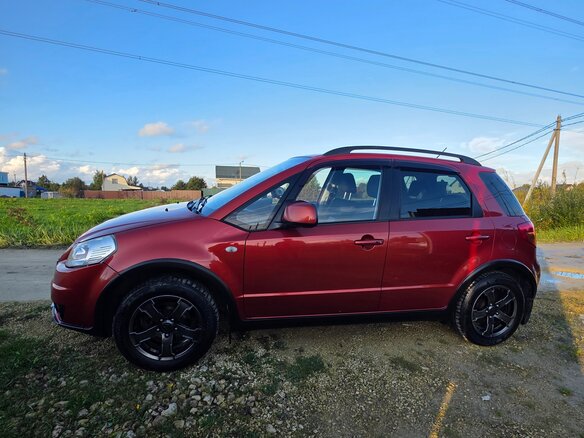 2010 Suzuki SX4 I (Classic) Рестайлинг, оранжевый, 645000 рублей - вид 11