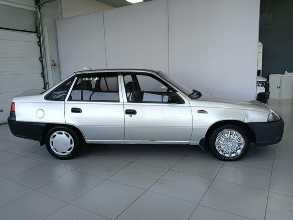 2011 Daewoo Nexia I Рестайлинг, серебристый, 170000 рублей - вид 9
