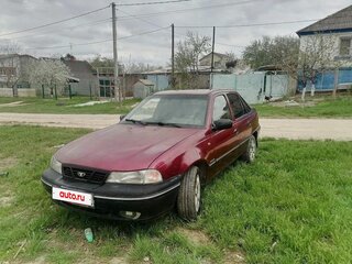 2007 Daewoo Nexia I, пурпурный, 130000 рублей, вид 1