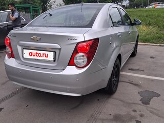 2012 Chevrolet Aveo II, серебристый, 615000 рублей, вид 2