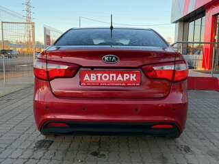 2012 Kia Rio 4-speed III, красный, 929000 рублей, вид 5