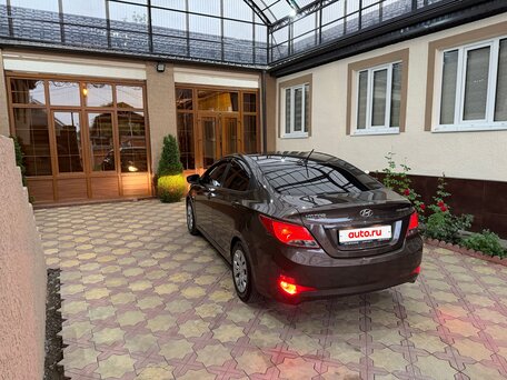2014 Hyundai Solaris I Рестайлинг, коричневый, вид 4
