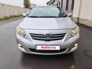 2009 Toyota Corolla X (E140, E150), серебристый, 535000 рублей, вид 2