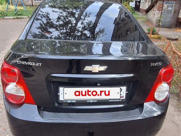 2012 Chevrolet Aveo II, чёрный, 460000 рублей - вид 1