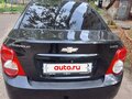 2012 Chevrolet Aveo II, чёрный, 460000 рублей - вид 1
