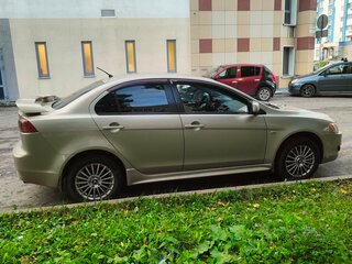 2007 Mitsubishi Lancer X, золотистый, 535000 рублей, вид 3