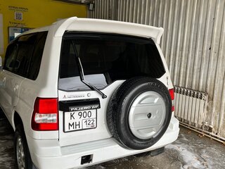1999 Mitsubishi Pajero iO, белый, 310000 рублей, вид 4