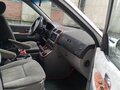 2005 Kia Carnival I Рестайлинг, серебристый, 480000 рублей - вид 4