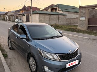 2014 Kia Rio 5-speed III, голубой, 630000 рублей, вид 3