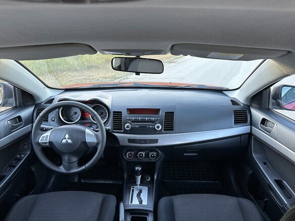 2007 Mitsubishi Lancer X, красный - вид 14