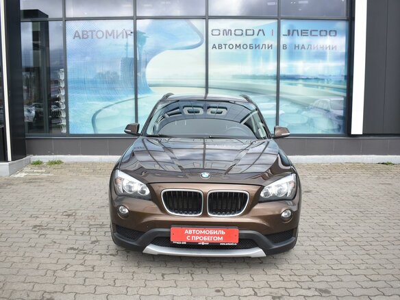 2013 BMW X1 18i I (E84) Рестайлинг, коричневый - вид 1