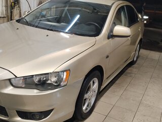 2010 Mitsubishi Lancer X, коричневый, 545000 рублей, вид 4