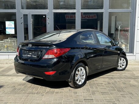 2014 Hyundai Solaris I, чёрный, 830000 рублей, вид 4