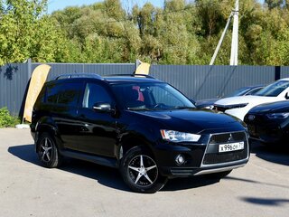 2009 Mitsubishi Outlander II Рестайлинг, чёрный, 950000 рублей, вид 2