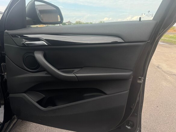 2018 BMW X1 18i sDrive II (F48), чёрный - вид 12
