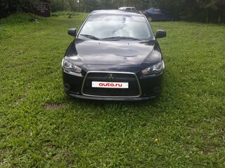 2011 Mitsubishi Lancer X Рестайлинг, чёрный, 700000 рублей, вид 1