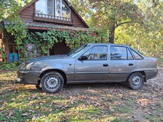 2012 Daewoo Nexia I Рестайлинг, серый, 230000 рублей, вид 3