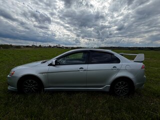 2012 Mitsubishi Lancer X Рестайлинг, серебристый, 650000 рублей, вид 2