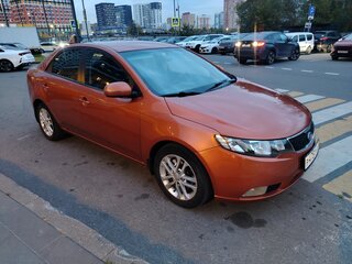 2011 Kia Cerato 6-speed II, оранжевый, 720000 рублей, вид 3