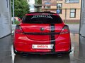 2010 Opel Astra GTC H Рестайлинг, красный - вид 5