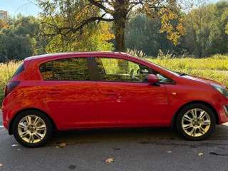 2011 Opel Corsa D Рестайлинг II, красный, 489900 рублей, вид 4