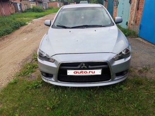 2011 Mitsubishi Lancer X Рестайлинг, серебристый, 570000 рублей, вид 2