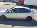 2010 Ford Focus II Рестайлинг, серебристый, 570000 рублей - вид 1