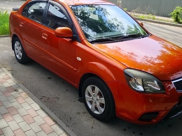 2010 Kia Rio II Рестайлинг, оранжевый, 570000 рублей - вид 2