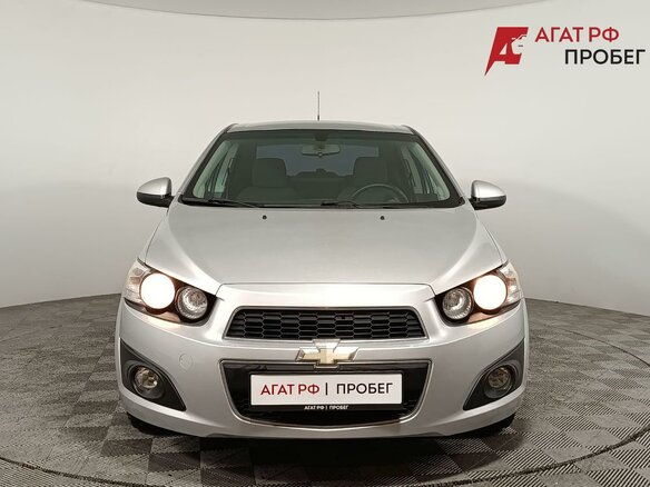 2012 Chevrolet Aveo II, серебристый, 570000 рублей - вид 1