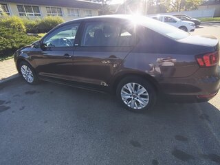 2014 Volkswagen Jetta VI Рестайлинг, коричневый, 950000 рублей, вид 4