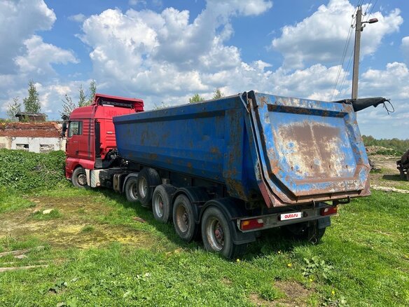2007 MAN TGA, красный, 2350000 рублей - вид 2