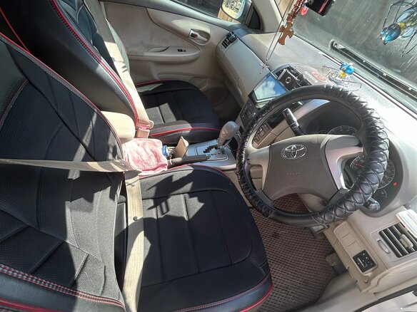 2010 Toyota Corolla Axio X (E140, E150) Рестайлинг, серебристый, 1200000 рублей - вид 9