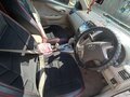 2010 Toyota Corolla Axio X (E140, E150) Рестайлинг, серебристый, 1200000 рублей - вид 9