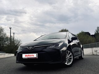 2019 Toyota Corolla XII (E210), коричневый, 1900000 рублей, вид 2