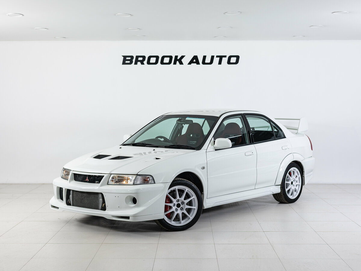 Открыть фотографии: Mitsubishi Lancer Evolution VI