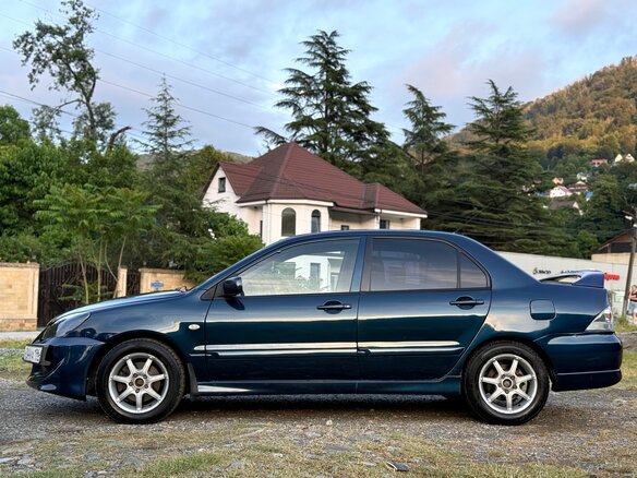 2006 Mitsubishi Lancer IX Рестайлинг, синий, 470000 рублей - вид 2
