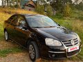 2010 Volkswagen Jetta V, чёрный - вид 1