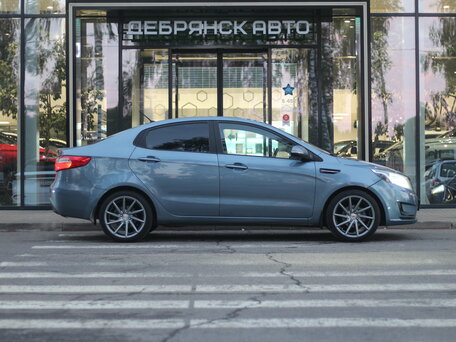 2013 Kia Rio 4-speed III, голубой, 830000 рублей, вид 4