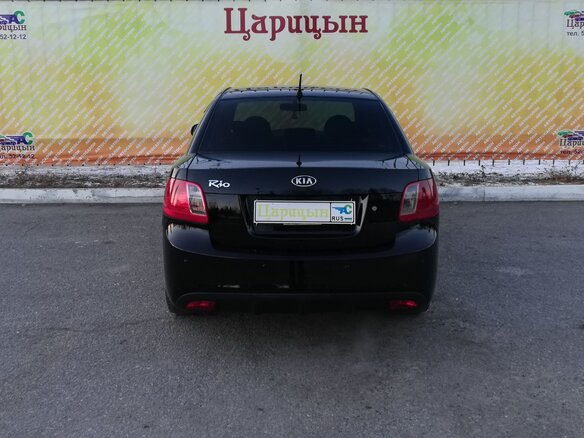 2011 Kia Rio II Рестайлинг, чёрный - вид 4
