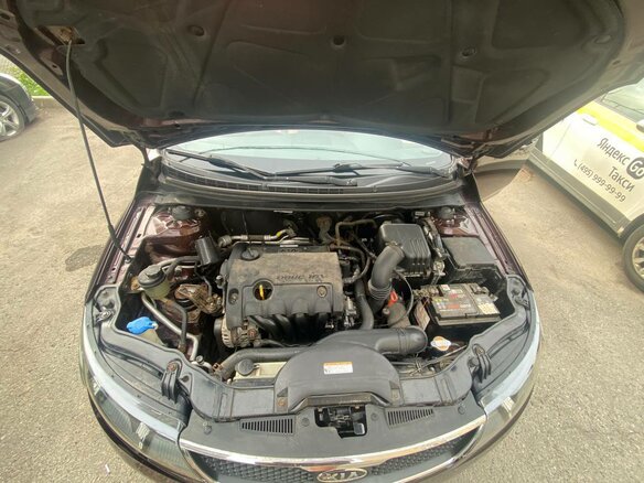 2010 Kia Cerato 4-speed II, пурпурный, 620000 рублей - вид 5