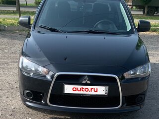 2010 Mitsubishi Lancer X, чёрный, 1845000 рублей, вид 1