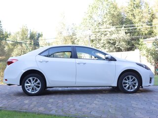 2014 Toyota Corolla XI (E160, E170, E180), белый, 1350000 рублей, вид 4