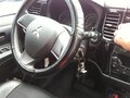 2014 Mitsubishi Outlander III, чёрный - вид 7