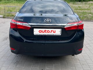 2014 Toyota Corolla XI (E160, E170, E180), серый, 900000 рублей, вид 4