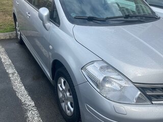2011 Nissan Tiida I Рестайлинг, серебристый, 900000 рублей, вид 2