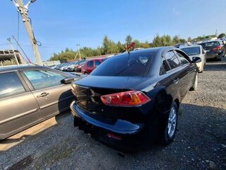 2012 Mitsubishi Lancer X Рестайлинг, чёрный, 603000 рублей, вид 2