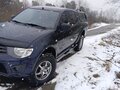 2011 Mitsubishi L200 IV, синий, 1250000 рублей - вид 4
