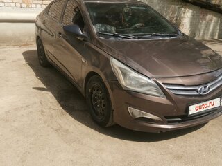 2016 Hyundai Solaris I Рестайлинг, коричневый, 650000 рублей, вид 3